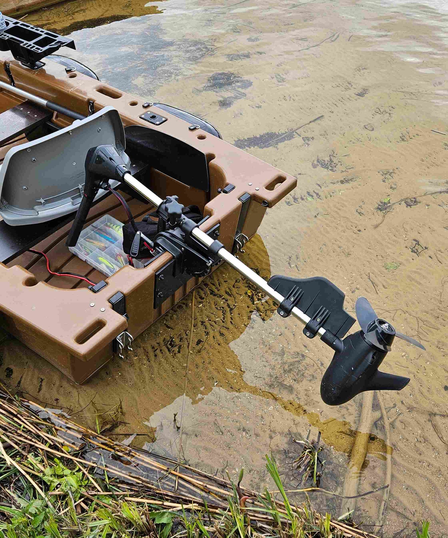 Haibo 12V electric trolling motor with Argo-Drive stabilizer fin installed on a fishing boat